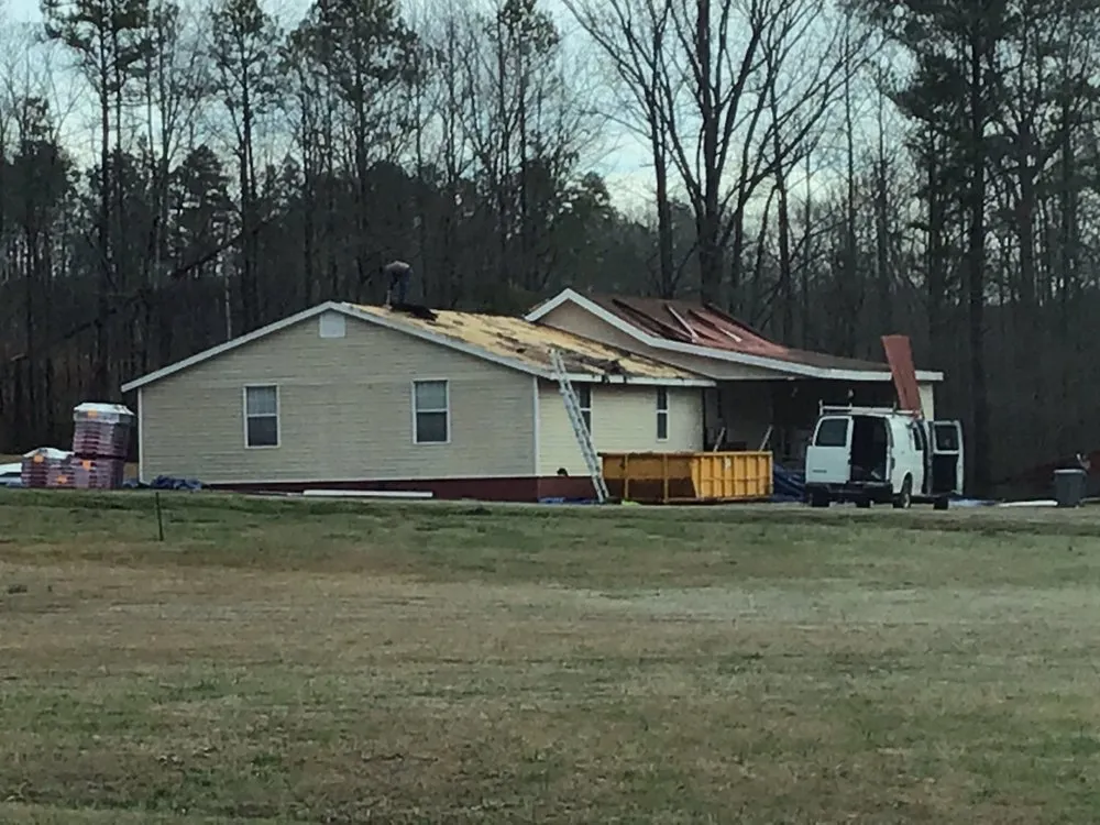 Slide of Tygre Roofing and Construction