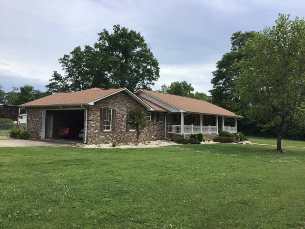 Slide of Tygre Roofing and Construction