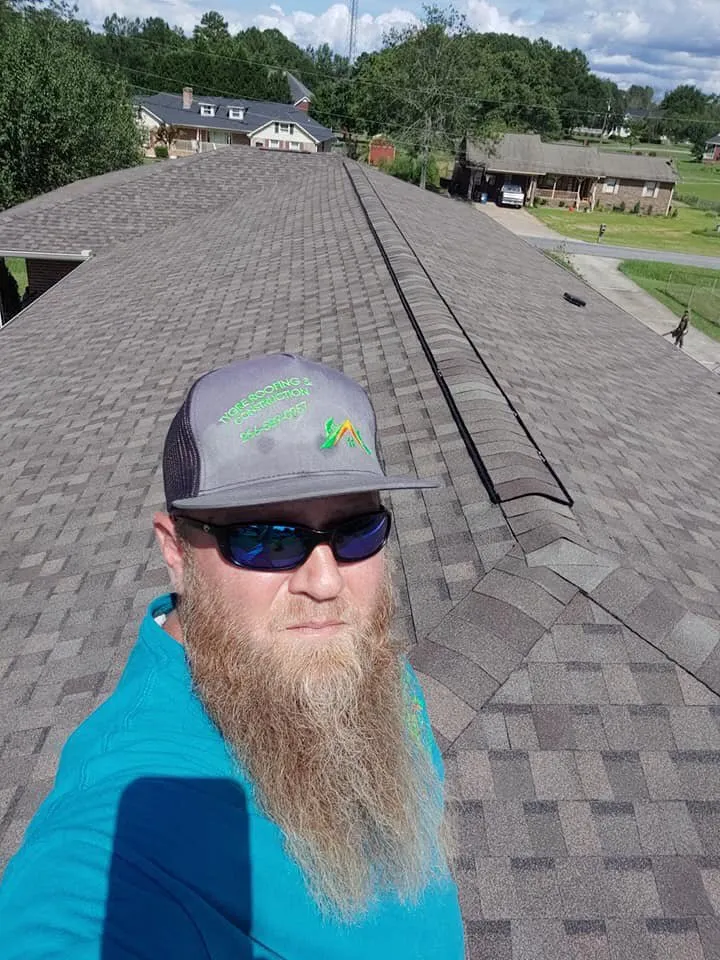 Slide of Tygre Roofing and Construction