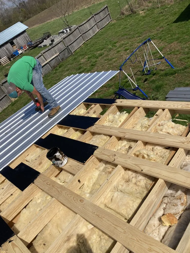 Local storm damage roof repair after storm damage in Summertown, TN by Tyler Moore Painting