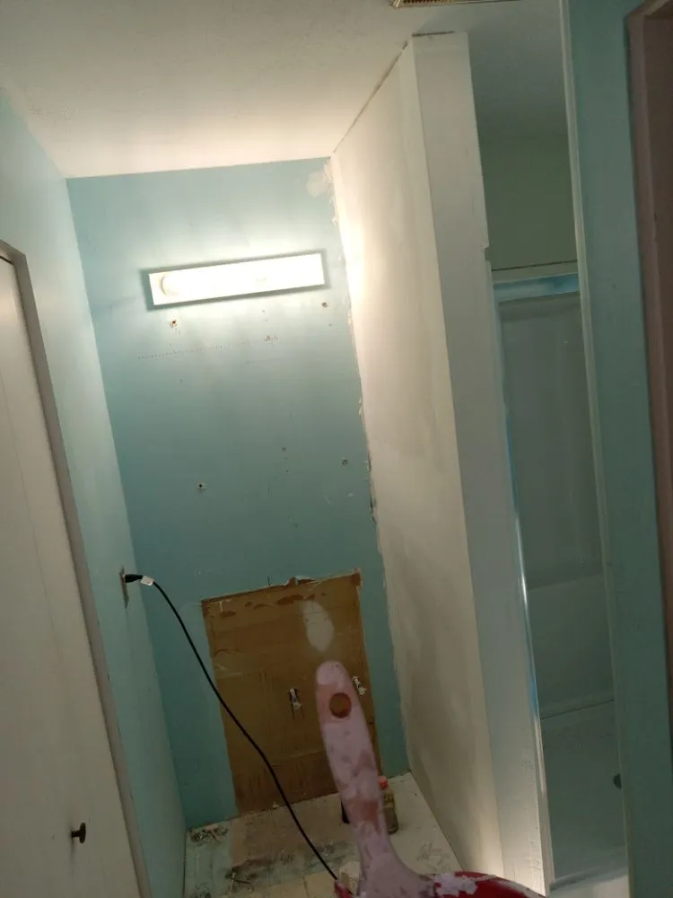 Slide of Tyler Scott's Handyman