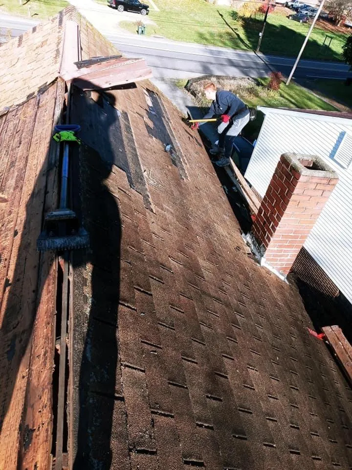 Slide of Tyler's Roofing