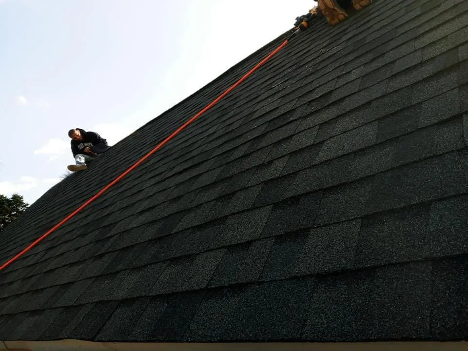 Slide of Tyler's Roofing