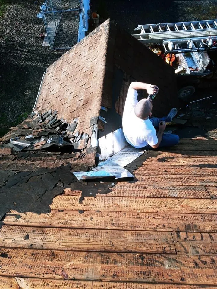 Slide of Tyler's Roofing