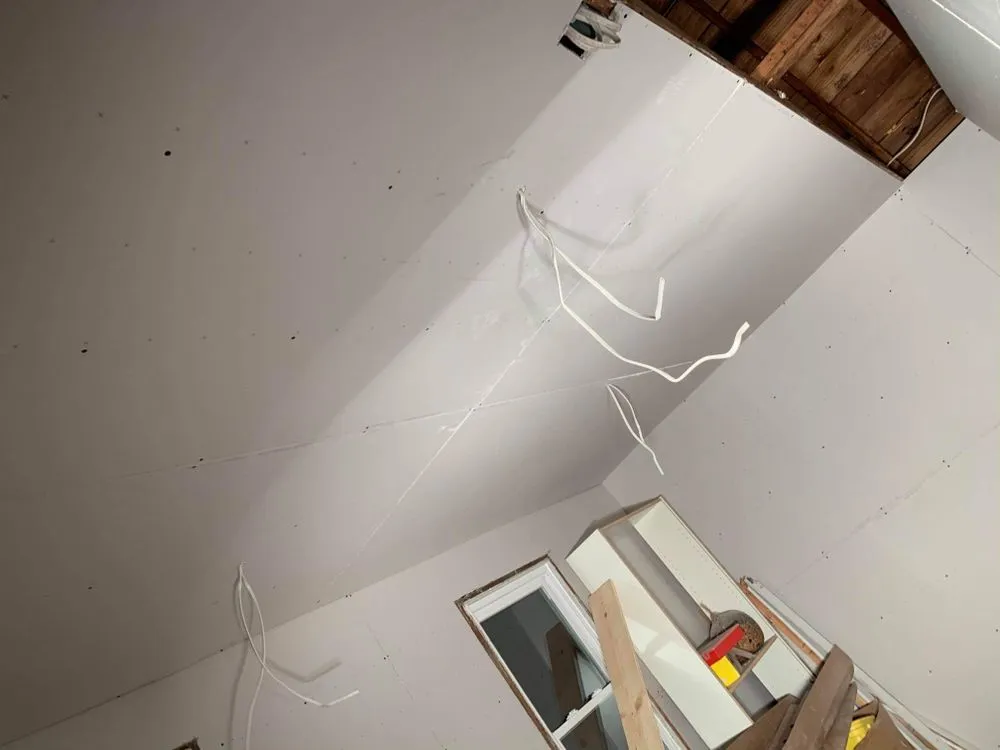 Slide of Tyler's Roofing