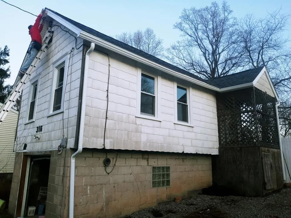 Slide of Tyler's Roofing