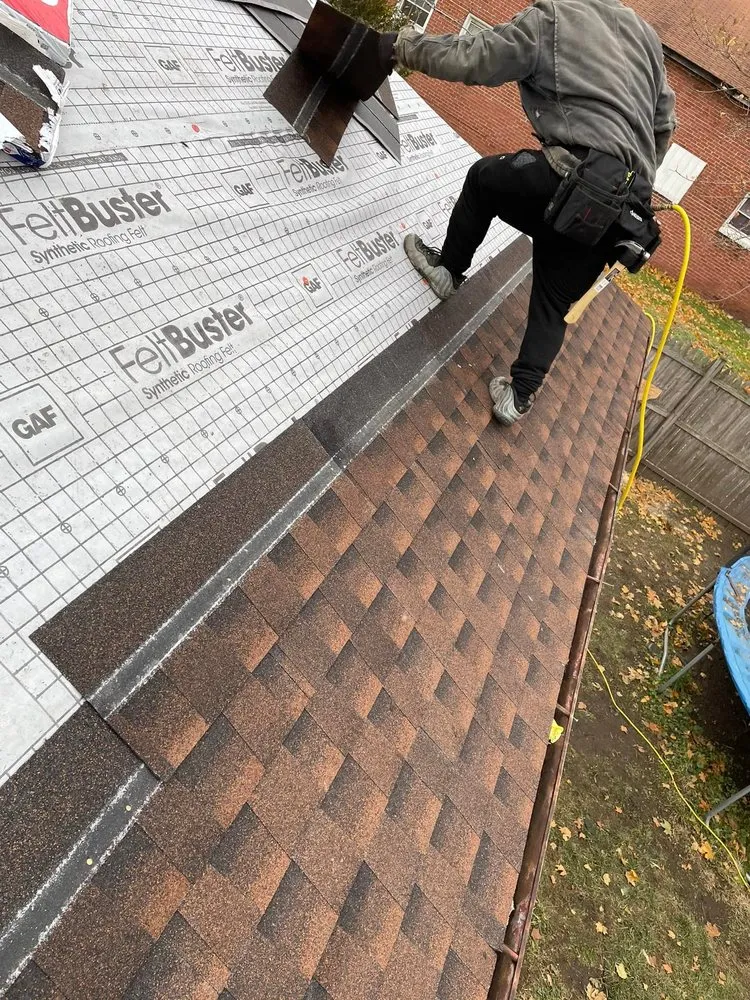 Slide of Tyler's Roofing