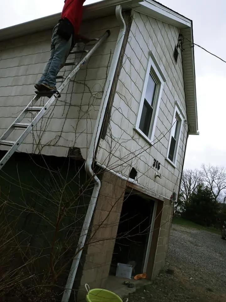 Slide of Tyler's Roofing