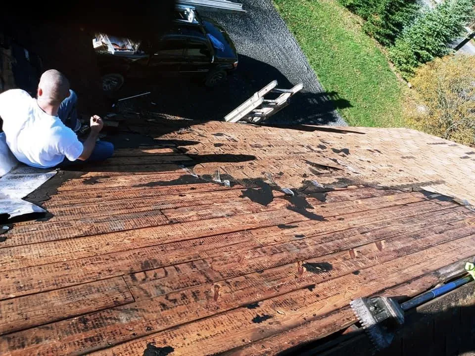 Slide of Tyler's Roofing