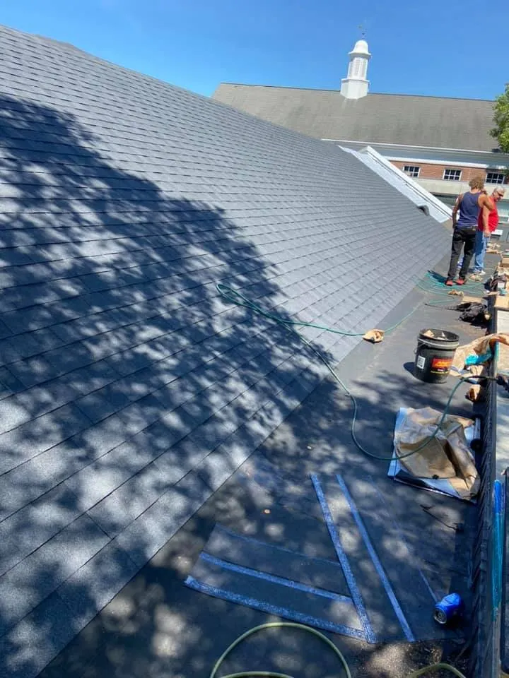 Slide of Tyler's Roofing