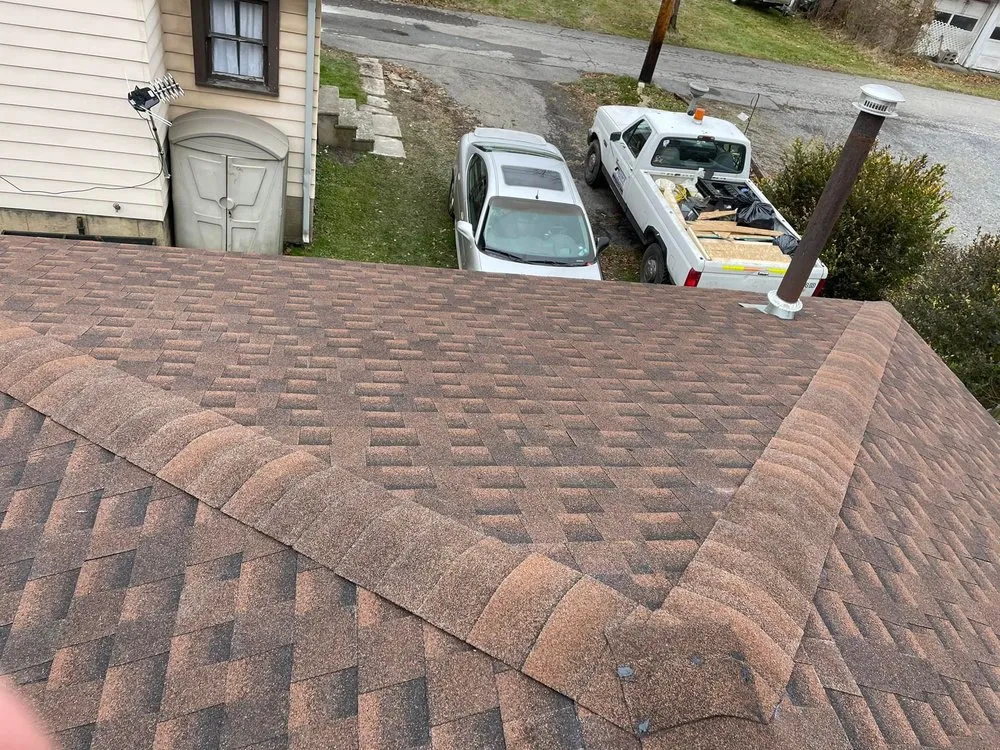 Slide of Tyler's Roofing