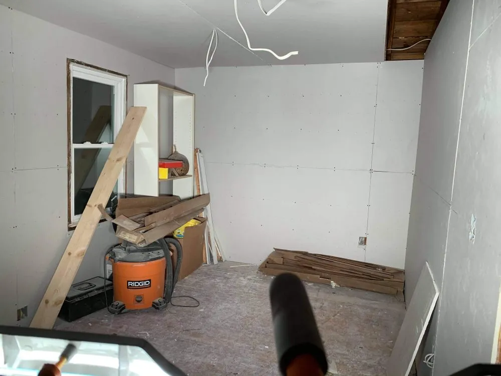 Slide of Tyler's Roofing