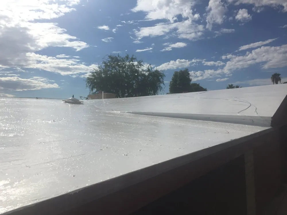 Slide of Tyler's White Roof Coating