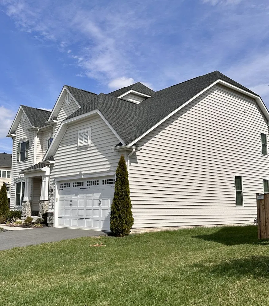 Slide of Tysons Roofing