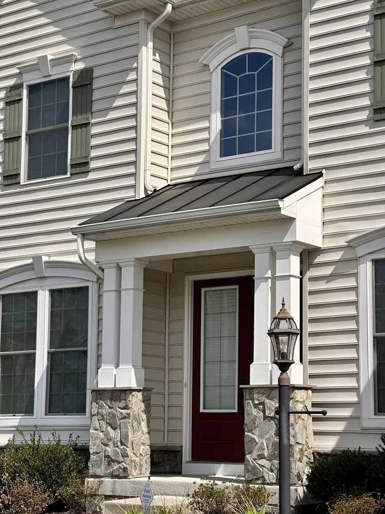 Slide of Tysons Roofing