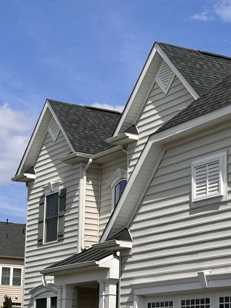 Slide of Tysons Roofing