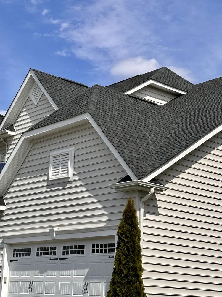 Slide of Tysons Roofing