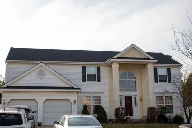 Expert shingle roofing service for residential properties in Sewell, NJ by Ultimate Improvements
