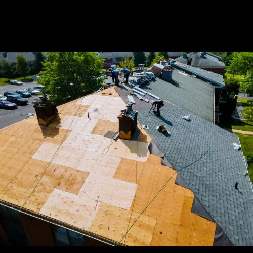 Slide of Ultimate Roofing Company