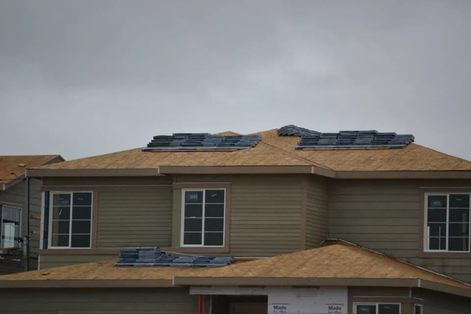 Slide of Ultimate Roofing Company