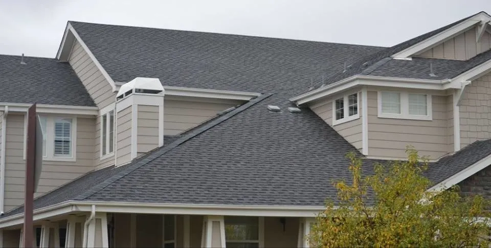 Slide of Ultimate Roofing Company