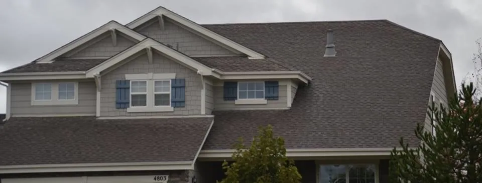 Slide of Ultimate Roofing Company