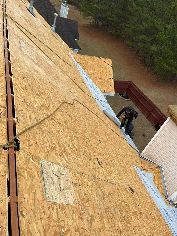 Slide of Umana Roofing