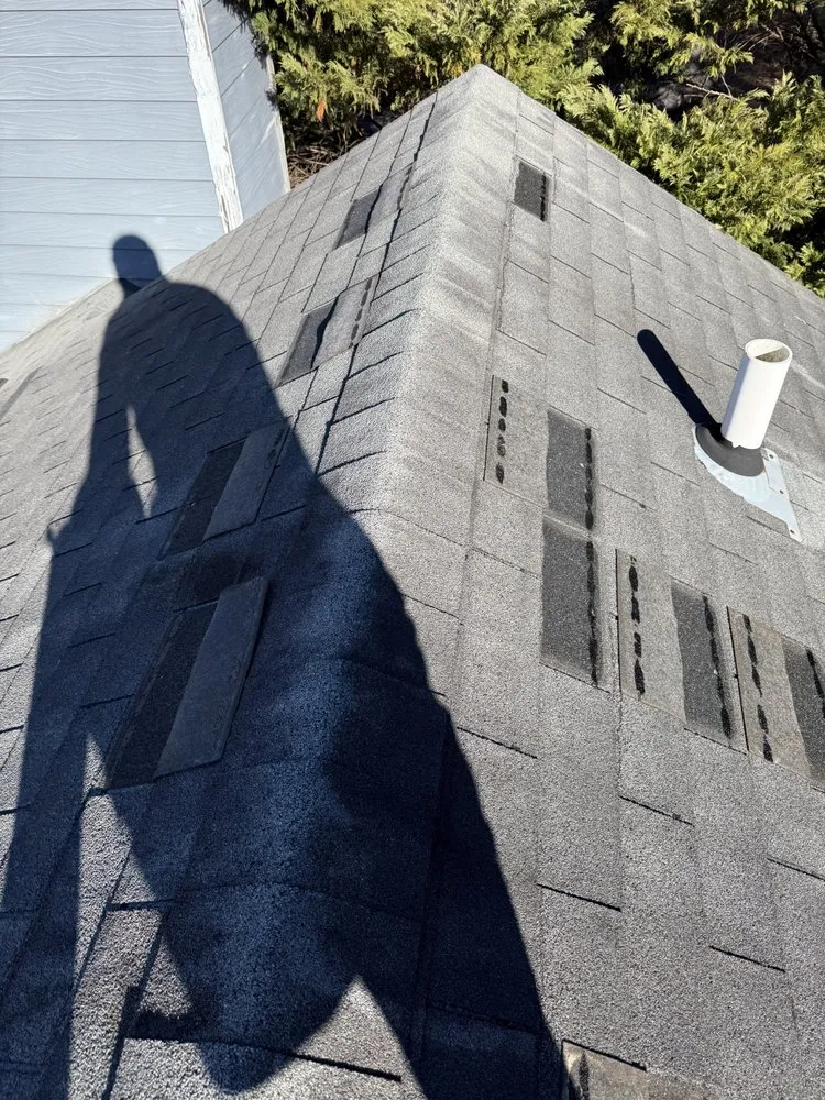 Slide of Umana Roofing