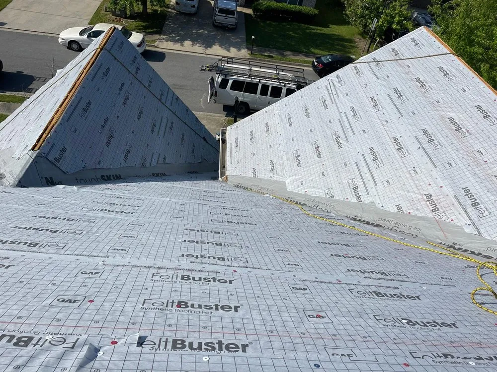 Slide of Umana Roofing