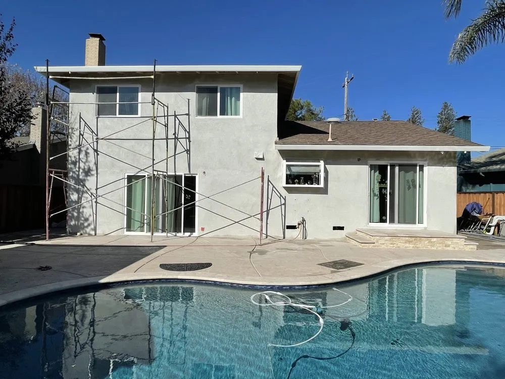 Slide of Umbrella Plastering & Roofing