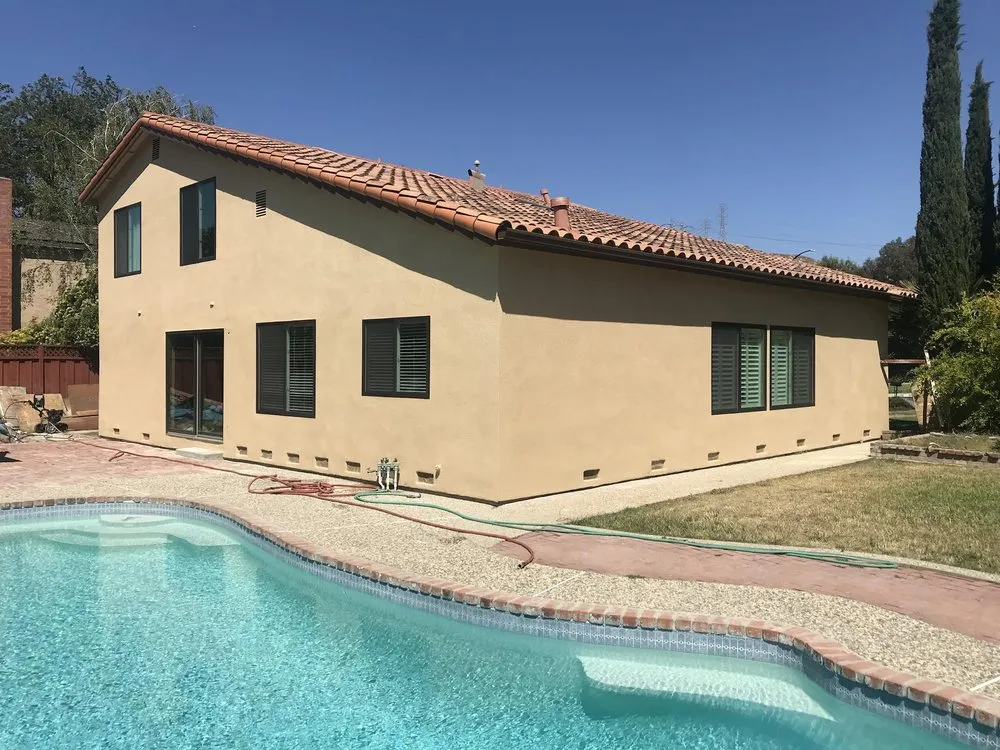 Slide of Umbrella Plastering & Roofing