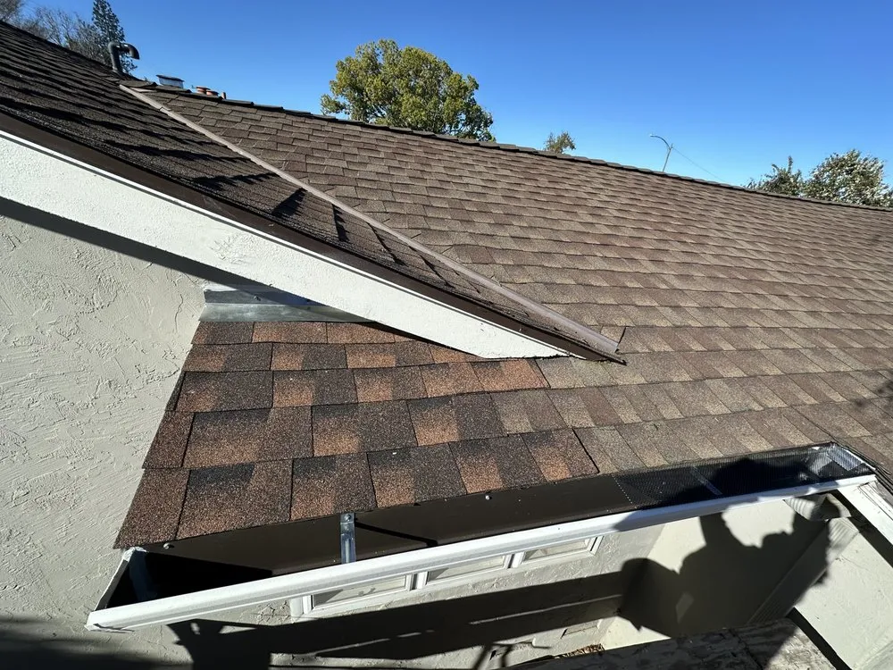 Slide of Umbrella Plastering & Roofing