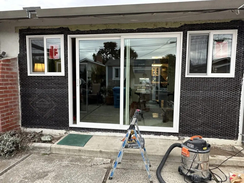 Slide of Umbrella Plastering & Roofing