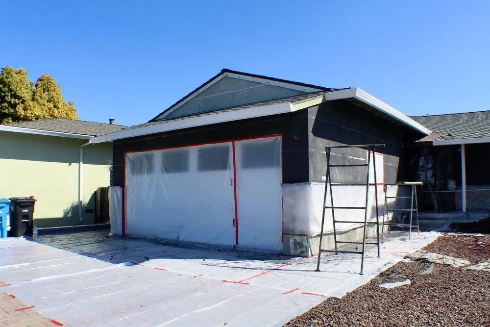 Slide of Umbrella Plastering & Roofing