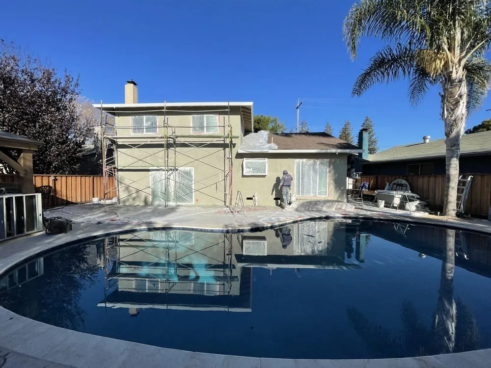 Slide of Umbrella Plastering & Roofing