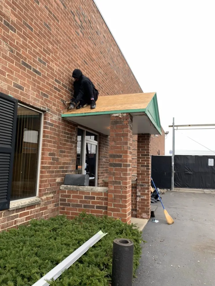 Slide of Umbrella Roofing