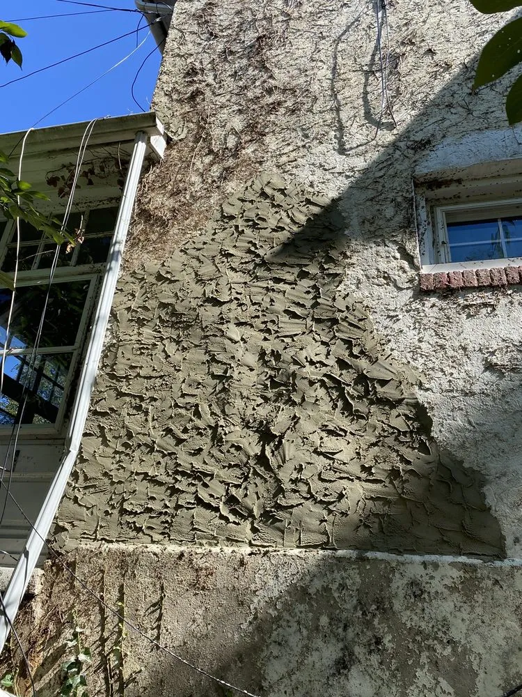 Slide of Uncle Al's Roofing