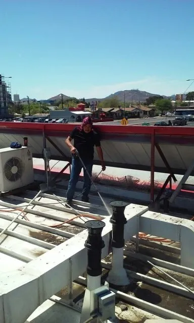 Slide of Uncle Gus Roofing And More