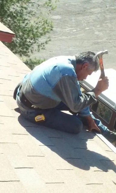 Slide of Uncle Gus Roofing And More