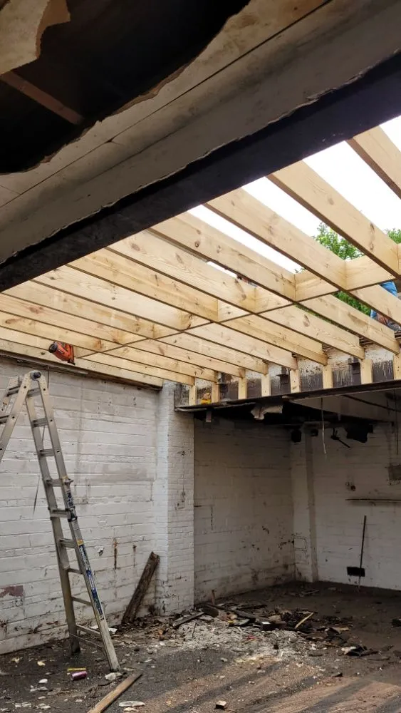 Slide of Undercover Commercial Roofing