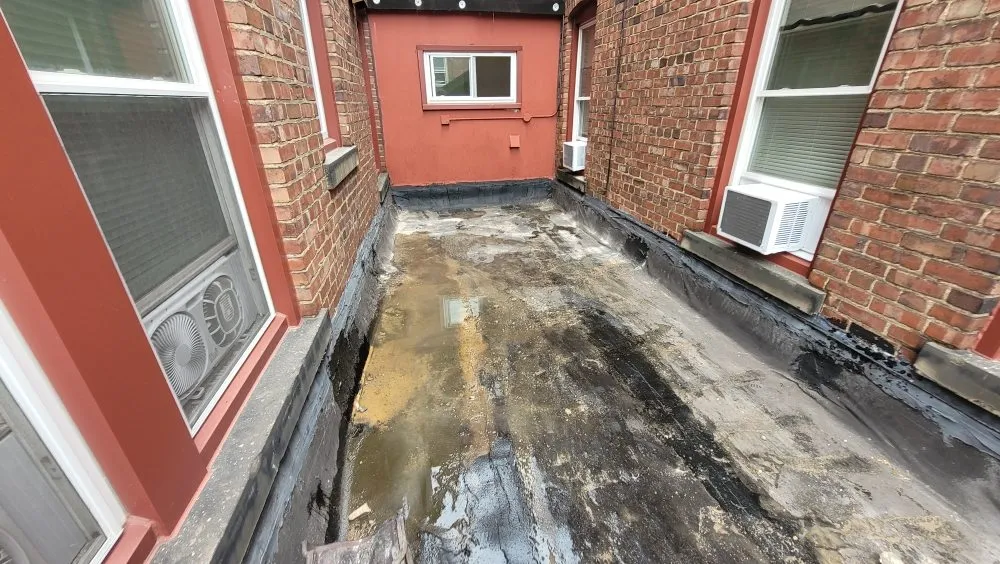 Slide of Undercover Commercial Roofing