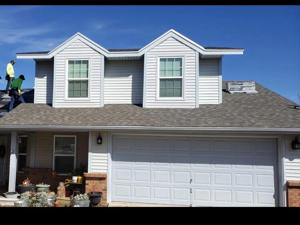 Slide of UNIQUE ROOFING