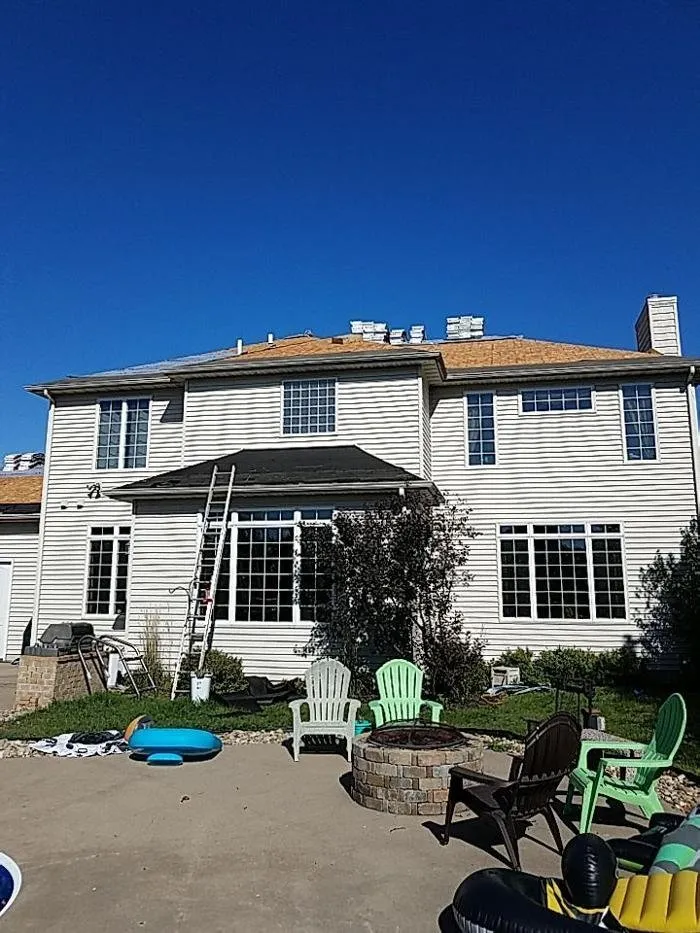 Expert storm damage roof repair in Princeton, IA by United American Contracting