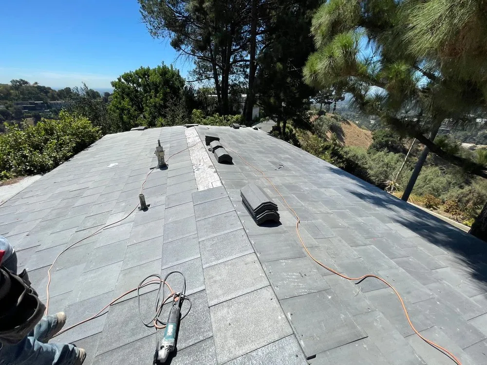 Slide of United Frontier Roofing