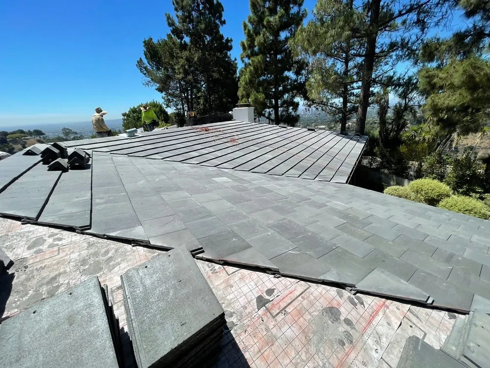 Slide of United Frontier Roofing