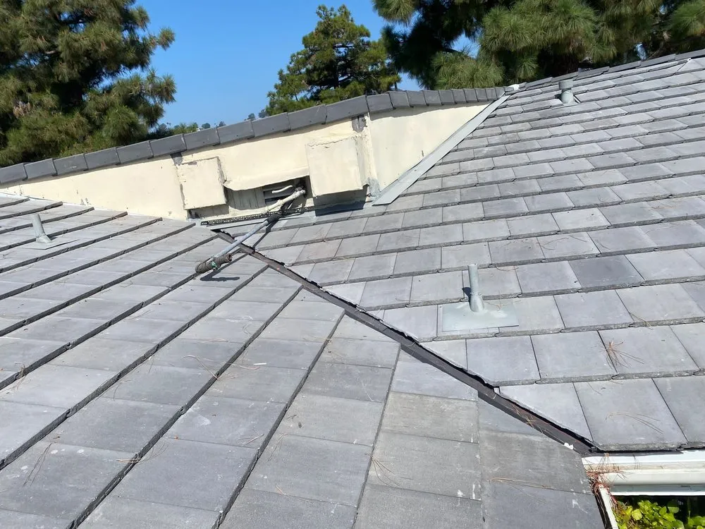 Slide of United Frontier Roofing