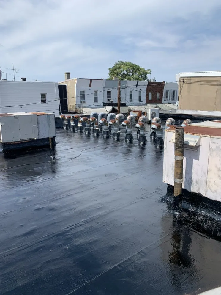 Slide of United Roofing co,