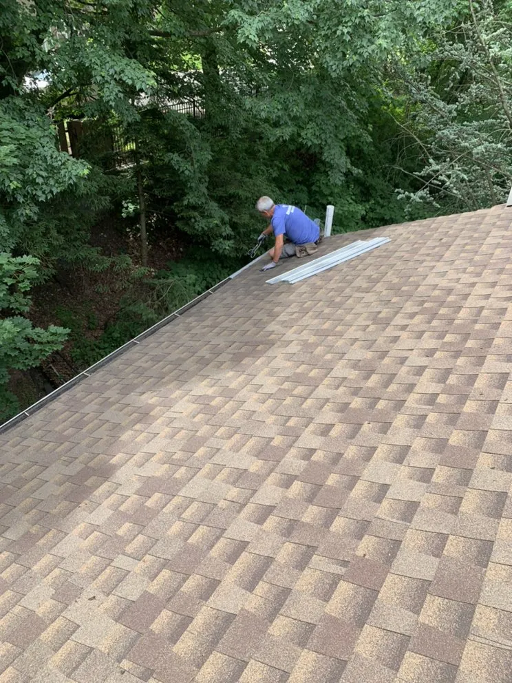Slide of United Roofing co,