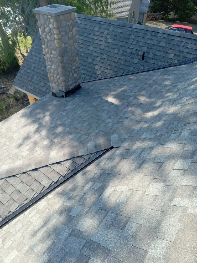 Slide of Universal Quality Roofing