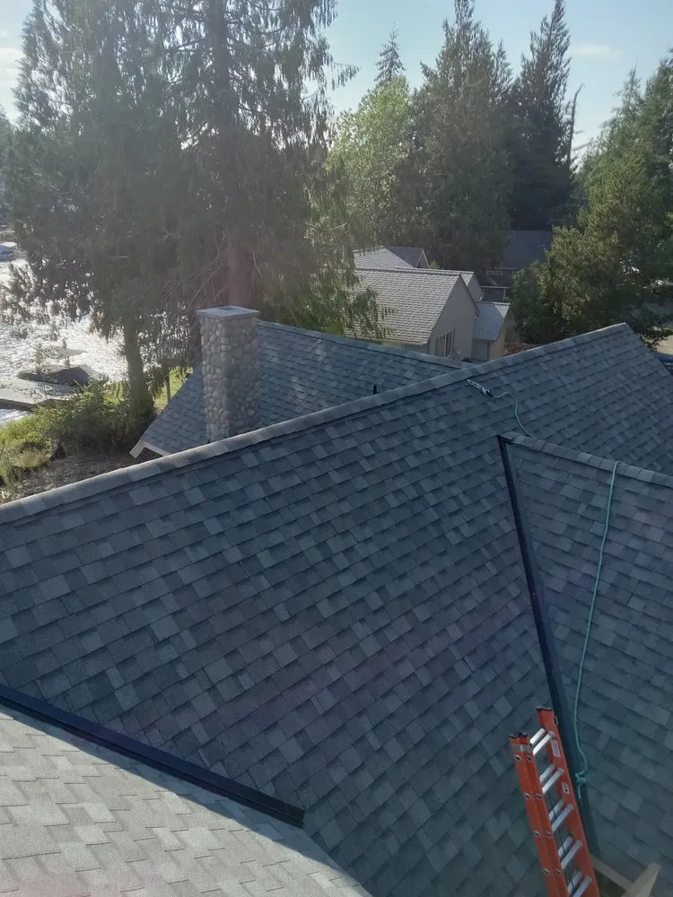 Slide of Universal Quality Roofing